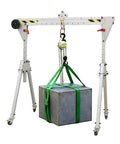 Heavy Duty Aluminum Gantry Crane Setup Boasting Slick 360 Spin Arm Quick Height Tweaks And No Sweat Rolling Casters lifting a heavy metal block.