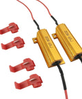 Close-up of iBrightstar 50W 6 ohm automotive load resistors in gold with red wires and red blade connectors