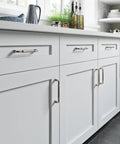 Brixton 5 1 16 Inch Center To Center Bar Pull In Brushed Satin Nickel For Cabinets And Drawers Durable Hardware With Lifetime Warranty Sleek Modern Look Easy Install And Long Lasting Finish, installed on white kitchen cabinets
