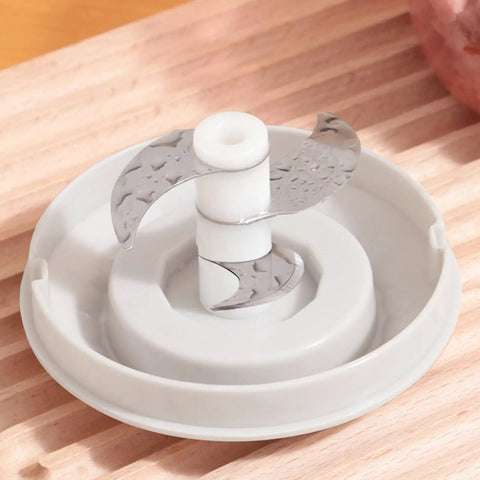 Cordless Electric Hand Mixer With Stainless Steel Beaters. USB Rechargeable power mixing blades in a gray base.