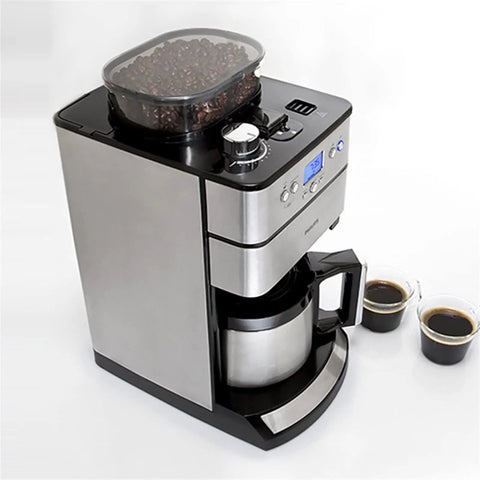 Fully Automatic Home Coffee Maker With Integrated Grinder And Guided Assisted Tamping, stainless steel, brewing espresso with mugs of coffee.
