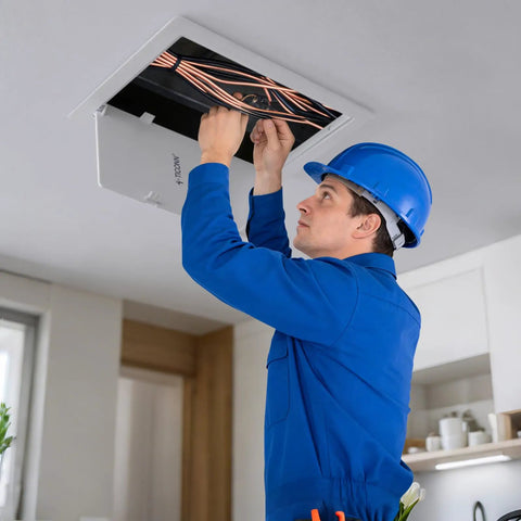 A worker installing the Kickass Eight By Eight Inch Abs Drywall Access Panel With Smooth Paintable Finish and Rock Solid Durability.