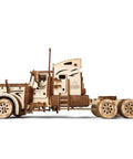 Mechanical 3D Wooden Puzzle Heavy Boy Truck VM-03 Model Kit For Adults And Teens, Realistic Gear Driven 18-Wheeler Build With Key Start, A Beast Of A Wooden Rig For Builders, Collectors, And Truck Fans. Side view of assembled wooden semi truck with sleeper cab and six wheels.