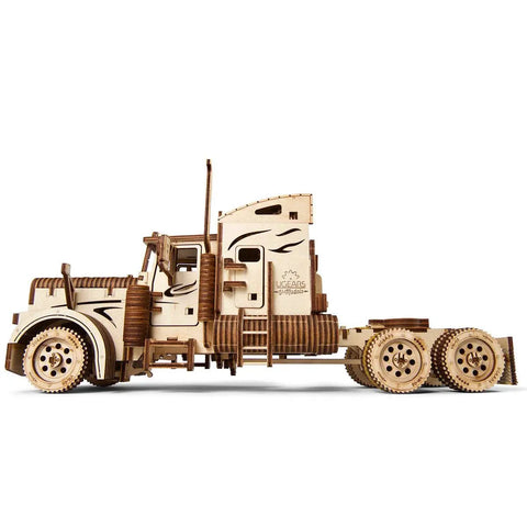 Mechanical 3D Wooden Puzzle Heavy Boy Truck VM-03 Model Kit For Adults And Teens, Realistic Gear Driven 18-Wheeler Build With Key Start, A Beast Of A Wooden Rig For Builders, Collectors, And Truck Fans. Side view of assembled wooden semi truck with sleeper cab and six wheels.
