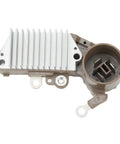Solid As A Rock Alternator Rebuild Kit For Pickup Trucks With 2.4L Inline Four Engine 1985 Through 1991 Grease Monkey Approved Voltage Regulator set in silver aluminum with connection ports.
