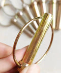 Close-up of a lynch pin with ring from the Eight Pack Five Sixteenth Inch Lynch Pins With Rings Heavy Duty Kit.
