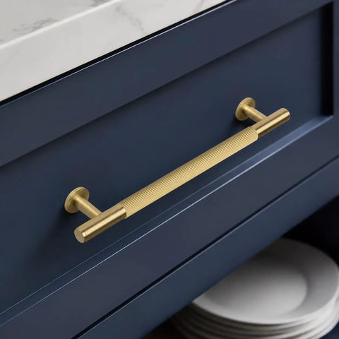 Top Shelf Solid Brass Cabinet Pulls With Slick Grooved Grip Design For No Sweat Installation on navy drawer.