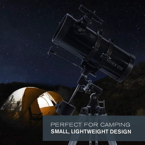 PowerSeeker 127EQ Telescope For Beginners With Manual German Equatorial Mount shown by illuminated tent at night
