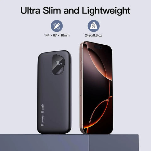 Two Pack Heavy Duty 10000mAh Portable Charger Power Bank Featuring Integrated Lightning And Usb C Cables Fast Charge Four Smartphones Simultaneously next to a smartphone, showcasing slim design and digital display.