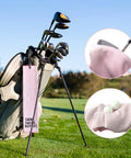 Swing Swear Repeat Embroidered Pink Golf Towel With Clip For Golf Bags hanging on a golf bag with close-ups of towel texture and pockets.