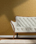 Modern Terrazzo Gold Metallic Wallpaper For Living Room Accent Wall Eco Friendly Vinyl Wall Covering Class A Fire Rated Pastel backdrop with white tufted sofa.