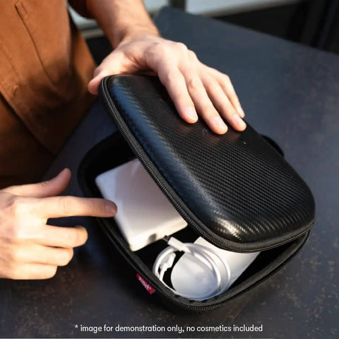 Slick Carbon Look Eva Tech Cable Organizer With Secure Mesh Pockets And Stretchy Elastic Bands For Phones Chargers And Power Banks Hella Rugged Badass Hard Shell Travel Box For Daily Grind And RoadTrips Black, open with charger inside.