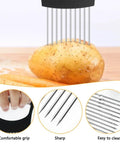 YuCool onion slicer with stainless steel prongs and two onion holders; front view