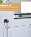 Vintage Black Iron Rope Cabinet Pulls Set for Rustic Kitchen Drawers and Doors with metal loop knobs on white cabinets