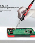 Handy Electric Soldering Iron Kit With Testing Tool Storage Bag Perfect For Appliance Repair And Circuit Boards Portable US Plug in use on circuit board.