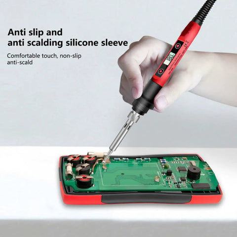 Handy Electric Soldering Iron Kit With Testing Tool Storage Bag Perfect For Appliance Repair And Circuit Boards Portable US Plug in use on circuit board.