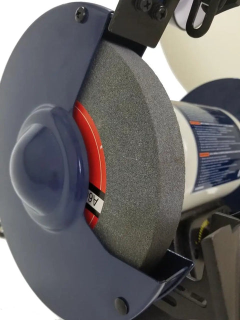 8 Inch Bench Grinder Featuring A Beast Mode 3/4 Hp Variable Speed Motor And Bulletproof Cast Iron Base For Slick Precision Grinding Polishing And Workshop Setup Up To 3400 Rpm with grinding wheel close-up.