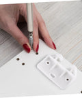 Hand installing 12 Pack Plastic Drawer Rail Slides Replacement Kit for Cabinets and Drawers With Smooth Sliding Tracks Durable Plastic Guides