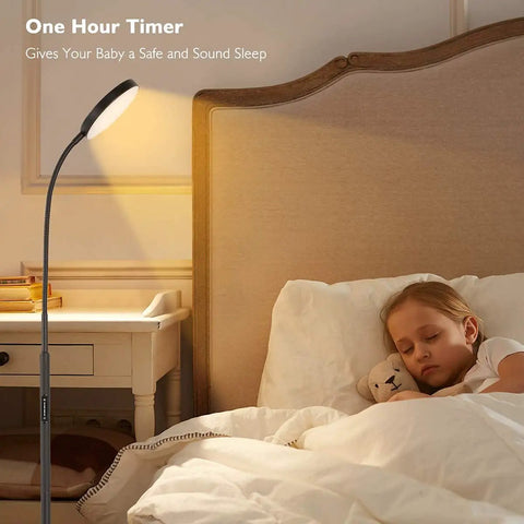 Modern Black LED Floor Lamp That Shines Brighter For Cozy Living Room Ambiance beside sleeping child in bedroom