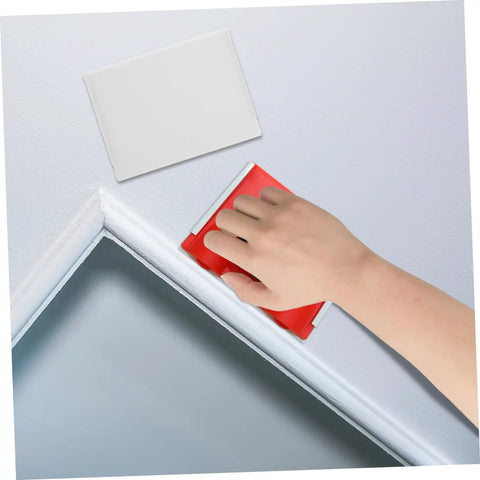 Hand using two pack paint edger pad refills for deck stain and wall painting, smooth edging on trim corner with elastic edger tool.