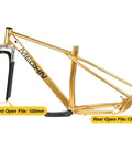 Gold mountain bike frame with fork, labeled front open file 100mm and rear open file 135mm, MEGHN branding on frame.