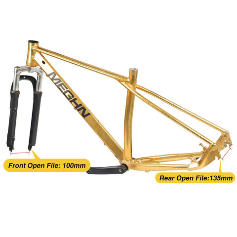 Gold mountain bike frame with fork, labeled front open file 100mm and rear open file 135mm, MEGHN branding on frame.