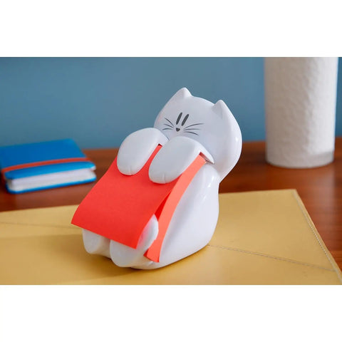 Cat Themed Pop Up Sticky Note Dispenser With 3x3 Pink Notes 45 Sheets Easy Refill on desk with background notebooks