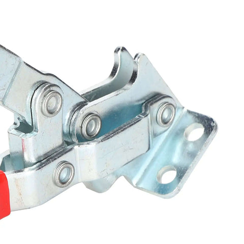 Close-up of Beefy Toggle Clamp With Quick Release Hold Down Fixture for Metal Plates and Circuit Boards, iron and plastic build.
