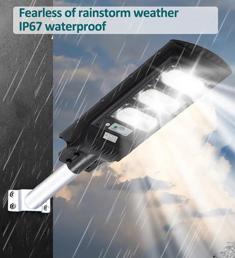 JUDYSSY Solar Lights Outdoor - 300W Led Solar Street Light Motion Sensor, waterproof design, illuminated in rainy weather.