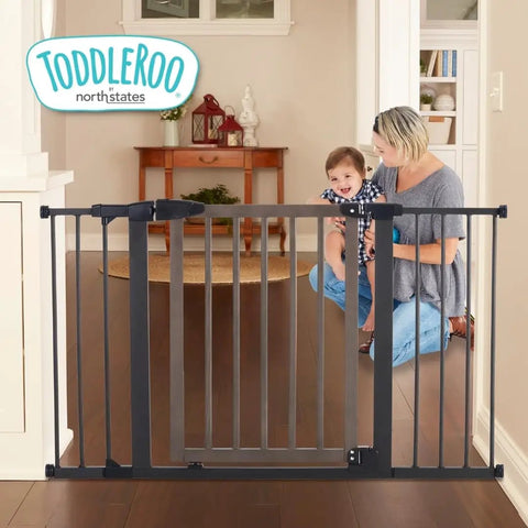 Extra Wide Auto Close Baby Gate With Hold Open for busy homes shown in hallway with child and parent nearby, graphite finish.