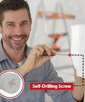 Hella Heavy Duty Drywall Anchors And Screws Kit 20 Pack Self Drilling Wall Plugs With Killer Rib Design Supporting 75 Pounds Load No Sweat Install nylon screw with user installing on wall.
