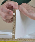 Hands installing a shelf using 100 Pack Of 304 Stainless Steel Cylindrical Locating Dowel Pins 5x40mm For Shelf Support Fittings And Mechanical Assembly.