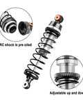 Close-up of Beefed-Up Front And Rear Aluminum Alloy RC Shock Set For 1/16 Mini-B And 1/18 Mini-T 2.0 LOS314004, black, adjustable.