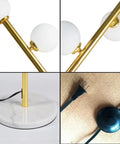 Close-up of Cozy Elegant Mid Century Floor Lamp With Nine Lights, showing gold accents, marble base, and in-line foot switch.