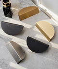 Champagne Bronze Cabinet Cup Pulls 10 Pack Modern Drawer Handles on marble surface
