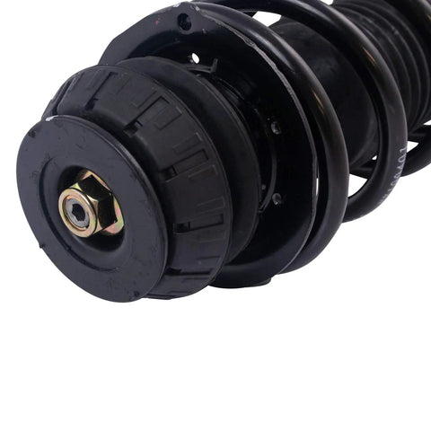 Front Steering And Suspension Kit With Two Front Inner And Outer Tie Rods Two Front Lower Control Arms With Ball Joints Strut And Spring Assemblies And Sway Bar Links For 2012 To 2019 Nissan Versa And 2014 To 2019 Versa Note black strut assembly close-up