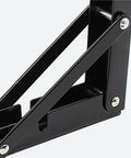 Close-up of Heavy Duty Folding Shelf Brackets Set 2 Pack Space Saving Triangle Wall Mounted Hinge Brackets For Tools And Shelves 6 Inch Black