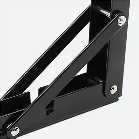 Close-up of Heavy Duty Folding Shelf Brackets Set 2 Pack Space Saving Triangle Wall Mounted Hinge Brackets For Tools And Shelves 6 Inch Black