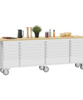 Heavy Duty Mobile Tool Chest With Smooth Rolling Casters And A Tight Locking System For The Ultimate Garage Setup features a wooden top and multiple storage bins.