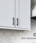 10 Pack Matte Black Cabinet Handles 4 Inch Center To Center, 6-3/8 Inch Overall Length, rust and stain resistant, installed on white cabinet