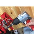 Heavy Duty Twin Hammer Air Impact Wrench Serving Six Eighty Newton Meters Of Serious Nutcracker Torque And A One Half Inch Square Drive in use.