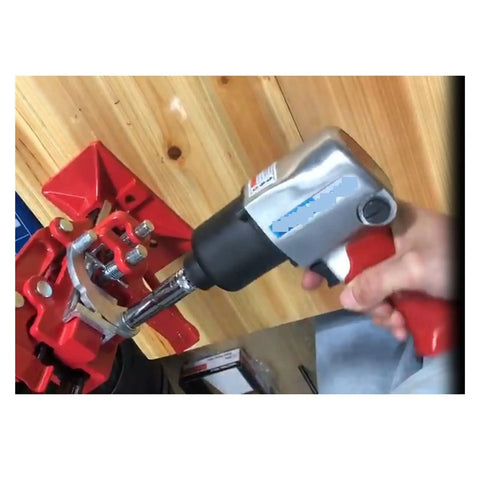 Heavy Duty Twin Hammer Air Impact Wrench Serving Six Eighty Newton Meters Of Serious Nutcracker Torque And A One Half Inch Square Drive in use.