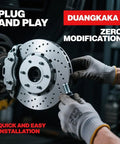 Mechanic installing a brake rotor with text about plug and play and zero modification features in a workshop setting.