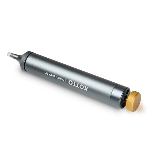 One Hand Trigger Desoldering Vacuum Pump Solder Sucker with aluminum body and silicone tip on white background