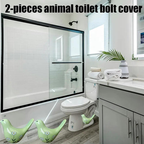 Heckin Cute Green Bird Toilet Bolt Covers Pair Decorative Ceramic Screw Caps For Bathroom Fixtures in a stylish bathroom.