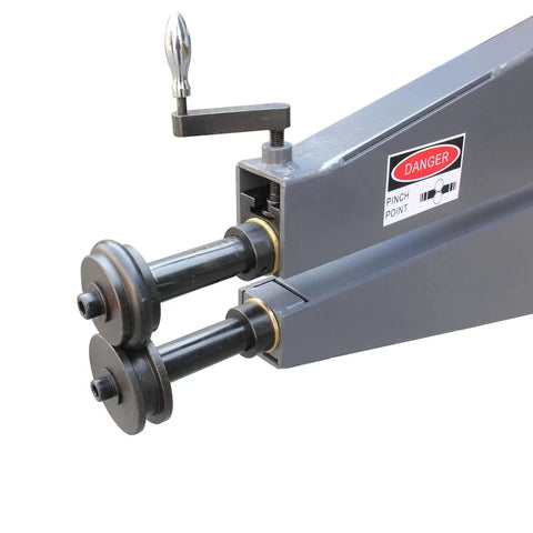 Close-up of the 36 Inch Throat Electric Bead Roller for Sheet Metal showing the rollers and warning label, a heavy-duty fabrication tool.