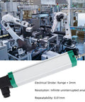 Heavy Duty Linear Displacement Sensor For Injection Molding Electronic Ruler Pull Rod IP67 Stainless Steel Build Great For Precise Positioning In Machines With Plug In Design And Low Noise Output in an industrial setting with robotic arms.