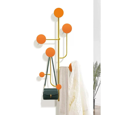 Hella Sturdy Wall Mount Coat Rack With Creative Cloak Hooks For Entryway Organization decorative coat rack with orange hooks and handbag.