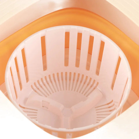 Inside view of the basket of the Hella Compact Foldable Mini Washing Machine 6 Liter Portable Washer for Baby Clothes.