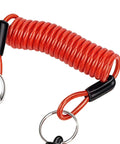 Close-up of red coiled Breakaway Cable For RV Trailers 4 Foot Or 6 Foot High Strength Flexible Towing Lanyard with metal hook.